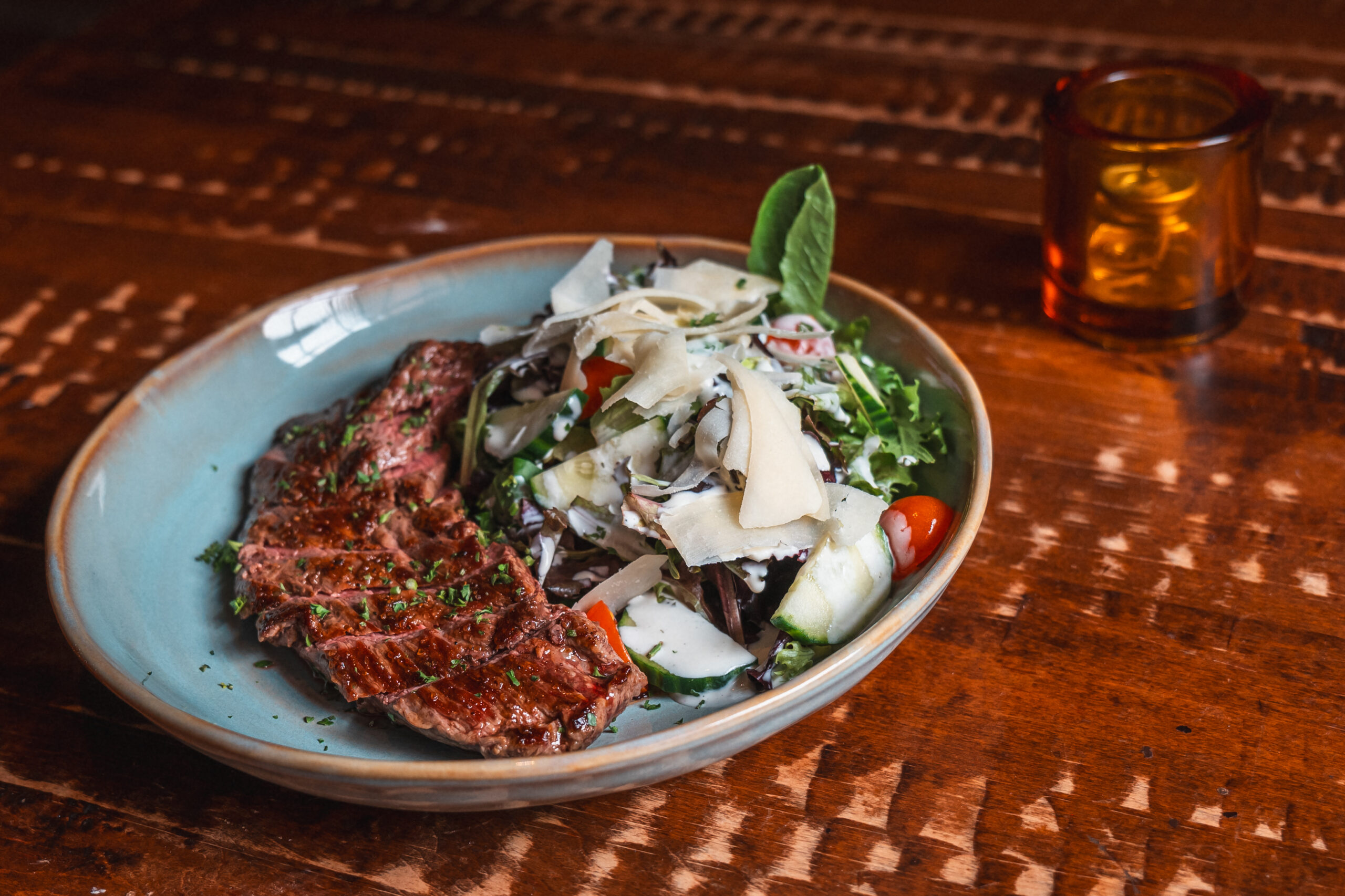 8 oz Bavette, spring mix, tomato, cucumber, shaved parmesan, ranch dressing